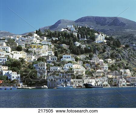 Stock Photography - Town at waterfront, Dodecanese Islands, Greece . Fotosearch
