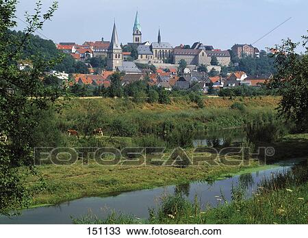 Town skyline against blue sky, River Diemel, Hesse, North Rhine-Westphalia, Germany View Large Photo Image Stock Image - Town skyline against blue sky, River Diemel, Hesse, North Rhine-Westphalia, Germany . Fotosearch