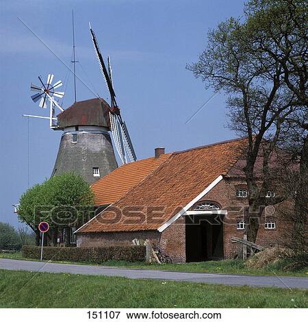 Traditional windmill against blue sky, Lower Saxony, Germany View Large Photo Image Stock Photo - Traditional windmill against blue sky, Lower Saxony, Germany . Fotosearch
