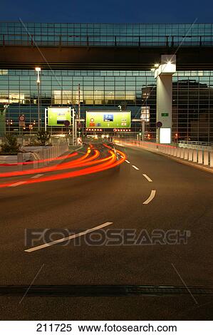 Stock Photography - Traffic on road at night, Frankfurt Rhein-Main Airport, Frankfurt, Hesse, Germany . Fotosearch