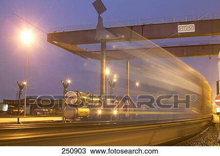 Train in motion on track, Duisburg, North Rhine-Westphalia, Germany View Large Photo Image Stock Image - Train in motion on track, Duisburg, North Rhine-Westphalia, Germany . Fotosearch