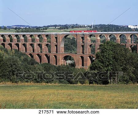 Train moving on bridge, Goltzsch Valley, Saxony, Germany View Large Photo Image Stock Image - Train moving on bridge, Goltzsch Valley, Saxony, Germany . Fotosearch