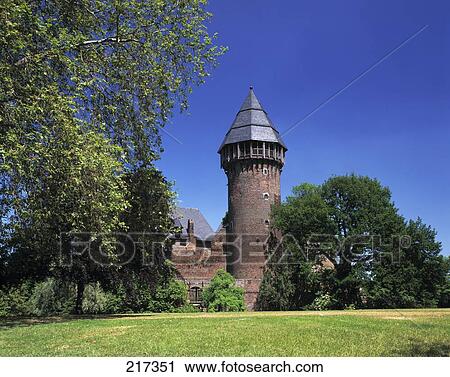 Trees and castle against blue sky View Large Photo Image Stock Image - Trees and castle against blue sky . Fotosearch