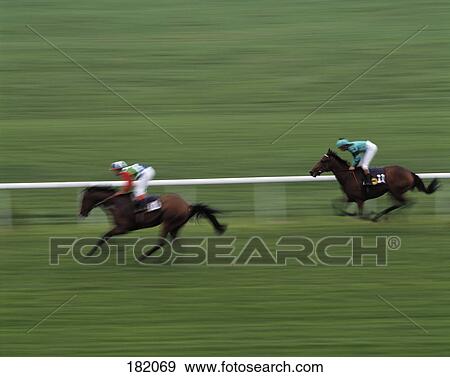 Two horse racers in horse race  View Large Photo Image Stock Photo - Two horse racers in horse race . Fotosearch