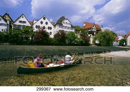 Two people boating in river, Danube River, Swabian Jura, Baden-Wurttemberg, Germany View Large Photo Image Stock Photo - Two people boating in river, Danube River, Swabian Jura, Baden-Wurttemberg, Germany . Fotosearch