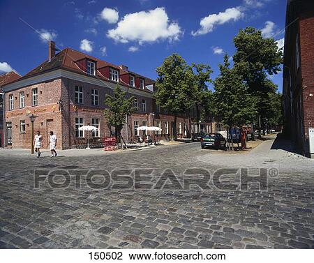 Two people walking in front of castle, Potsdam, Germany View Large Photo Image Stock Image - Two people walking in front of castle, Potsdam, Germany . Fotosearch