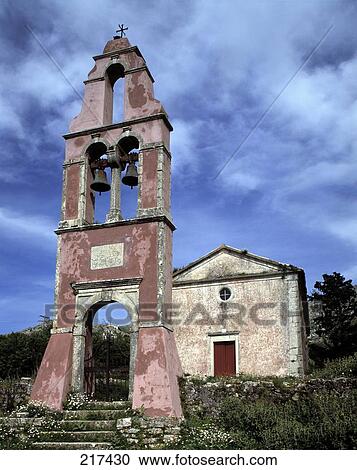 Weathered bell tower in front of church View Large Photo Image Stock Image - Weathered bell tower in front of church . Fotosearch