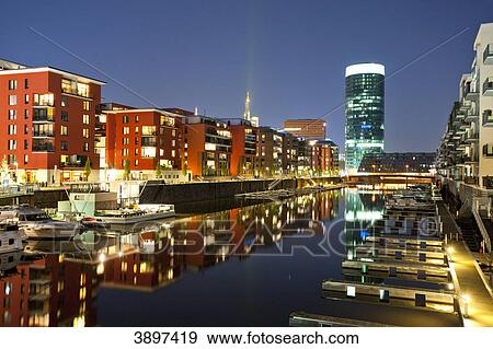Stock Photo - Western Port with apartment buildings and Westhafen Tower, Frankfurt am Main, Germany . Fotosearch