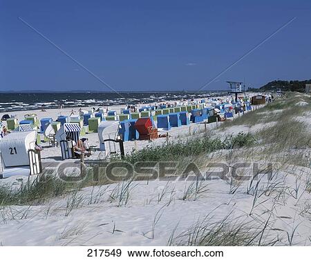 Stock Photo - Wicker chairs on beach, Usedom, Schleswig-Holstein, Germany . Fotosearch