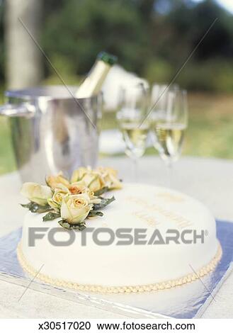 Happy Anniversary Cake And Champagne In Bucket Close Up Stock