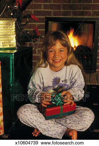 Portrait Of A Girl 6 8 Sitting On The Floor By A Fireplace