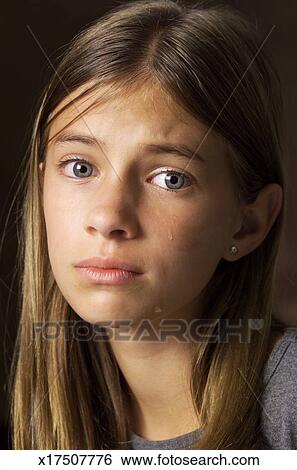 Stock Images of a caucasian preteen girl with long brown hair is ...