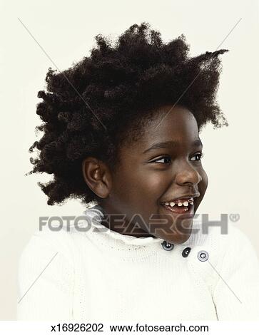 Portrait Of A Young Girl With Afro Hair Laughing Stock Image