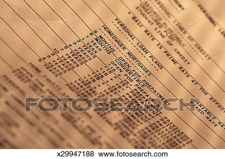 Picture - Computer printout of mortgage and loan plans. Fotosearch - Search Stock Photos, Images, Print Photographs, and Photo Clip Art