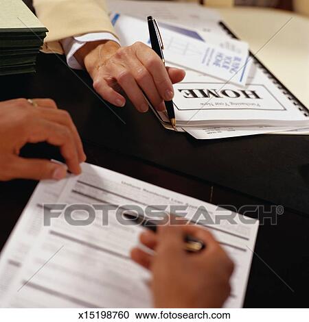 Stock Photography - Filling Out a Home Loan Application. Fotosearch - Search Stock Photos, Pictures, Wall Murals, Images, and Photo Clipart