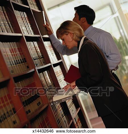 Lawyers Researching Information in a Law Library Stock ...