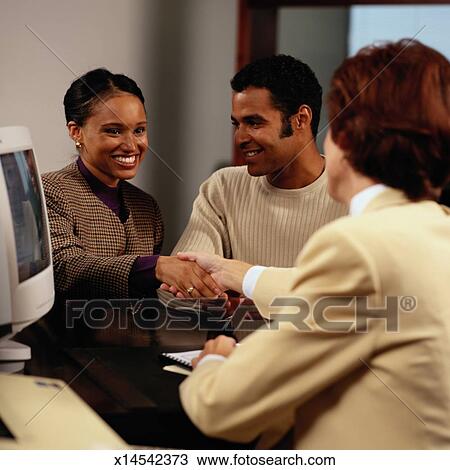Stock Photo - Loan Officer Shaking Woman's Hand. Fotosearch - Search Stock Images, Poster Photographs, Pictures, and Clip Art Photos