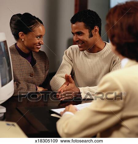 Smiling Couple Applying for Home Loan View Large Photo Image Stock Photograph - Smiling Couple Applying for Home Loan. Fotosearch - Search Stock Photography, Posters, Pictures, and Photo Clipart Images