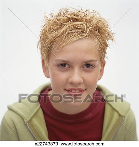 Young Girl With Short Blonde Spiky Hair Posing In Studio Portrait