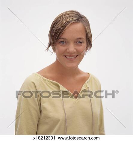 Young Woman With Short Blonde Hair Posing In Studio Portrait