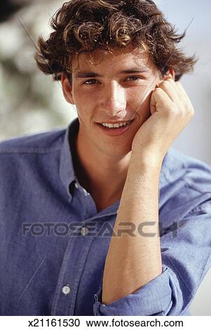Young Man With Curly Hair Portrait Stock Image X21161530