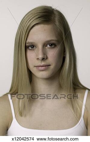 Teenage Girl 16 17 With Long Blonde Hair Posing In Studio