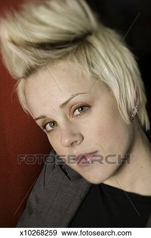 Young Woman With Spiky Hair Posing Portrait Close Up Stock Photo