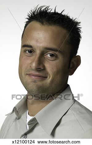 Man With Spiky Hair Posing In Studio Portrait Picture
