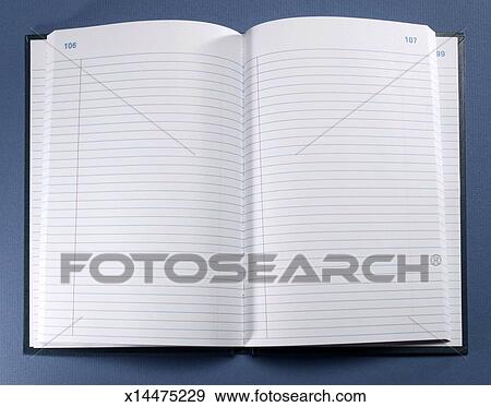 stock photograph of open blank notebook with lined paper overhead