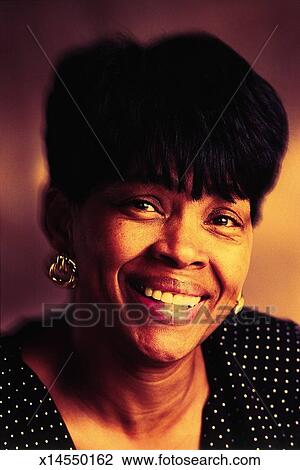 Happy African American Woman With Short Black Hair Wearing A Black