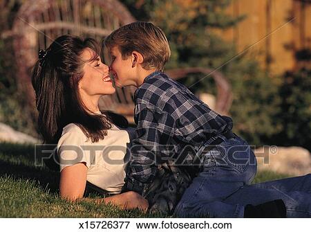 Boy kiss woman