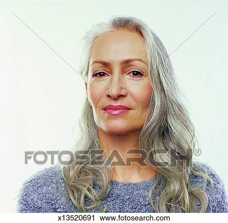 Studio Portrait Of A Mature Woman With Long Grey Hair Stock Image