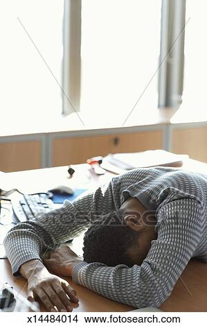 Man Asleep On Desk Picture X14484014 Fotosearch