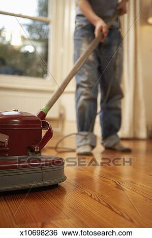 Man Polishing Wooden Floor Stock Photograph X10698236 Fotosearch