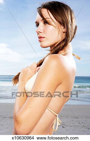 young brunette female wearing bikini