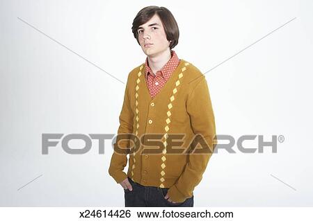 Teenage Boy 15 17 With Bob Haircut Hands In Pockets Portrait