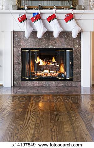 Stockings Hanging Over Fireplace Stock Photo X14197849 Fotosearch