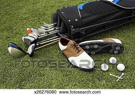 Close Up Shot Of Golf Balls And Golf Clubs