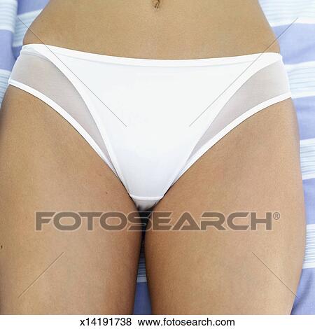 Close Up Of A Young Woman Wearing White Panties Close Up Of A Young Woman Wearing White Panties