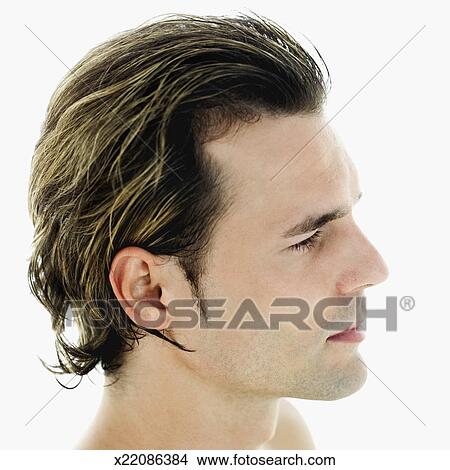Side profile of a young man Picture | x22086384 | Fotosearch