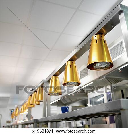 Stock Photography Of Close Up Heat Lamps In A Restaurant Kitchen Close Up Of Heat Lamps In A Restaurant Kitchen