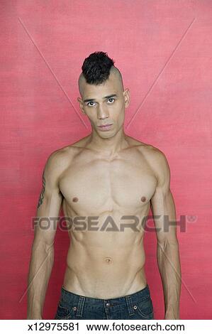 Shirtless Young Man With A Mohawk Haircut Stock Image
