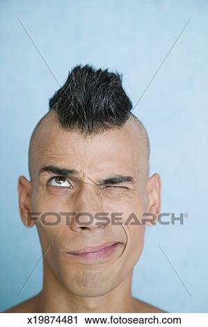 Young Man Looking Up At His Mohawk Haircut Stock Image X19874481