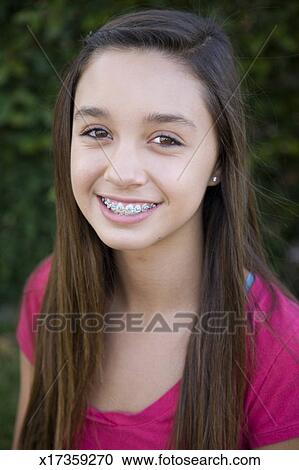 Portrait of 12 year old girl with braces Stock Image | x17359270 ...