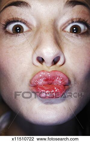 Young woman with puckered lips, close-up Stock Image | x11510722 ...