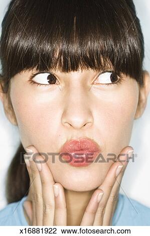 Young woman with puckered lips, close-up Stock Image | x16881922 ...