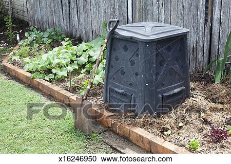 Compost Bin In A Backyard Vegetable Garden Stock Image