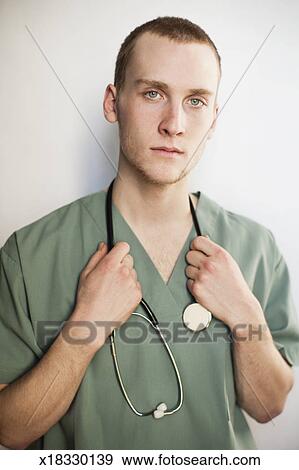 Stock Photograph - Young medical intern , portrait. Fotosearch - Search Stock Photography, Posters, Pictures, and Photo Clipart Images