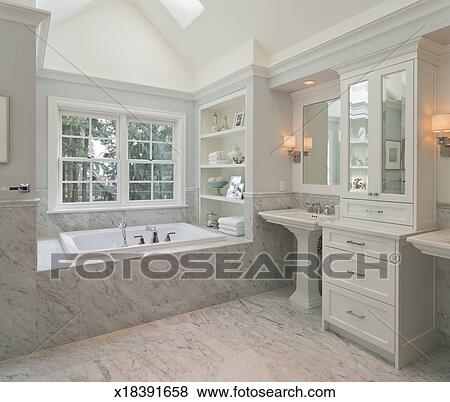 Master Bathroom With Marble And Custom Trim Stock Photo