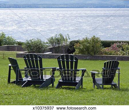 Picture Of Adirondack Chairs Facing Lake X10375937 Search Stock